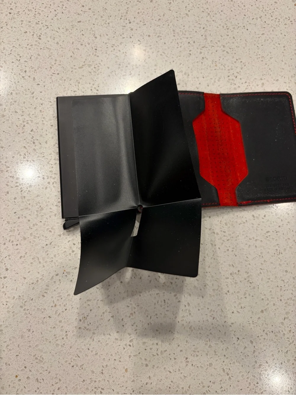 Secrid Black Perforated Leather Card Wallet with Red Stitching